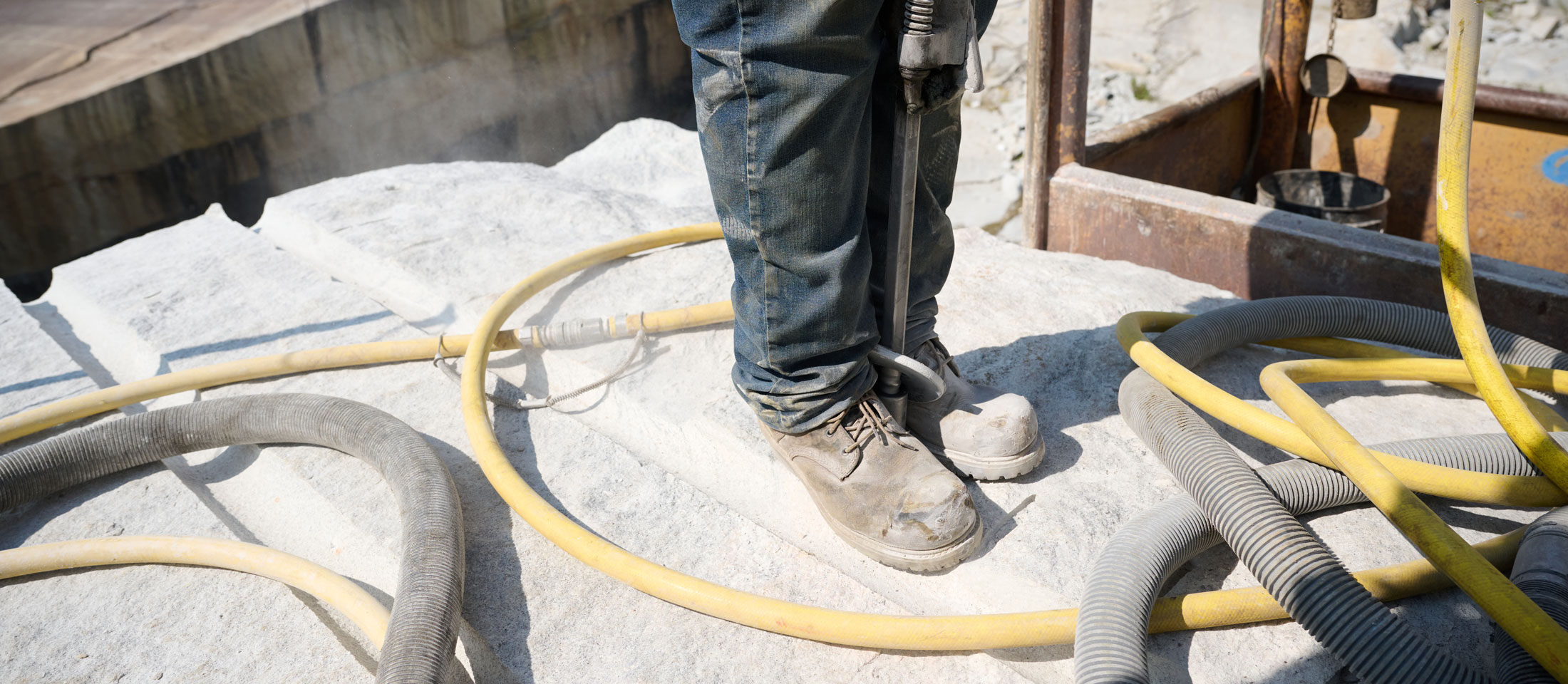 A man wearing Chippewa Steel Toe Boots on a job site.